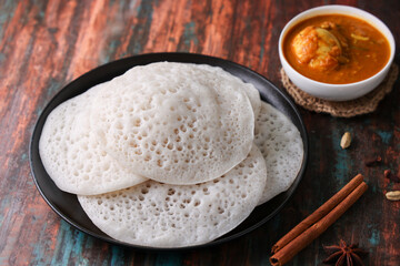 Appam pancake Kerala breakfast food Kadala curry egg curry chickpea Masala and tea, Christian...