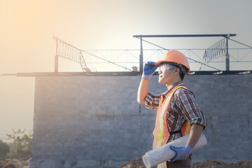 Portrait of an attractive worker on a construction site