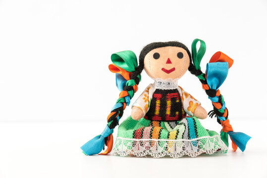 Tradicional mexican doll  in a colorful dress of Mexico  from Queretaro, hand crafted, front view - Muñeca mexicana