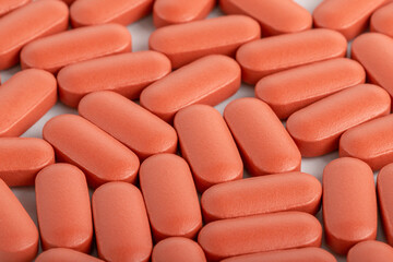 Orange medical pills full frame background