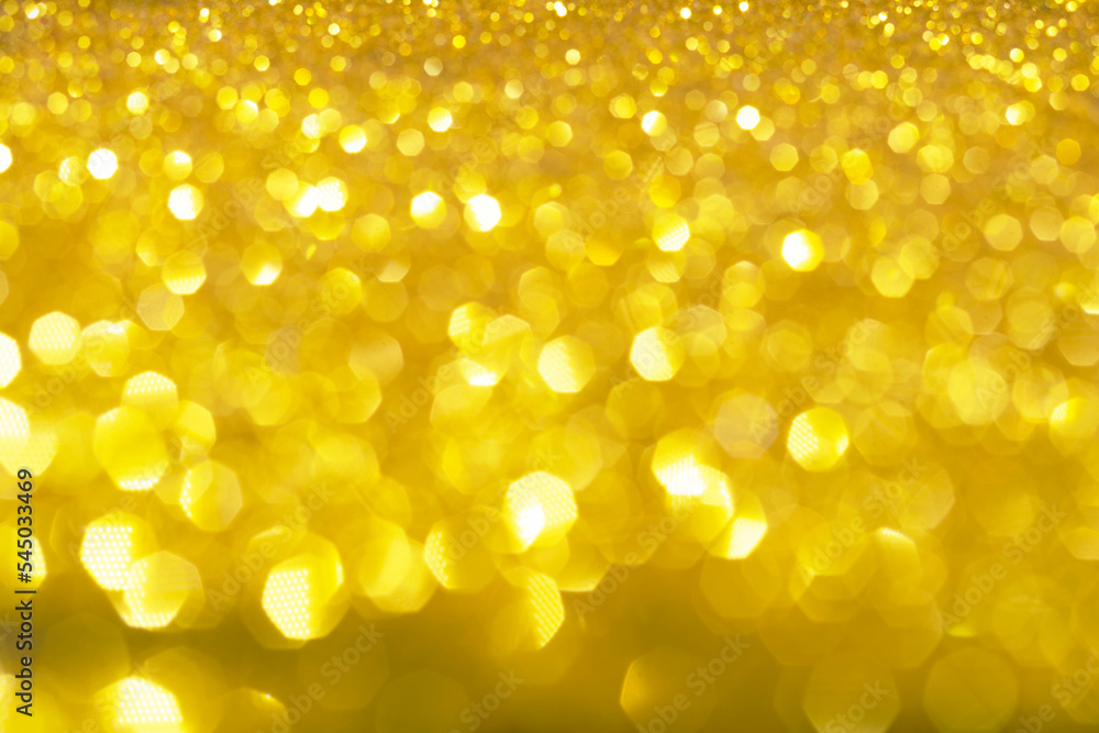 Poster abstract golden texture in blurry light for background. glitter pattern for photo effect and wallpap