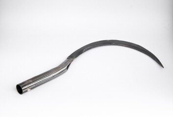 scythe on a white background