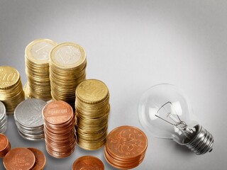 Golden coins on desk, energy crisis concept