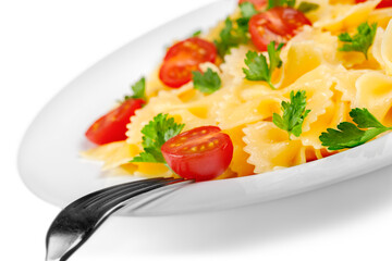 Delicious pasta with vegetables on white plate on white background