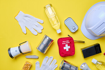 Disaster preparedness kit on yellow background.	 - obrazy, fototapety, plakaty