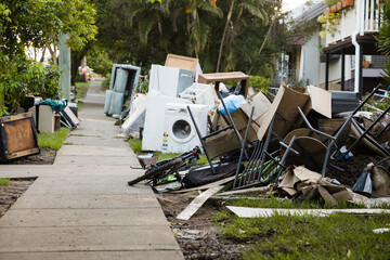 Kerbside rubbish and waste waiting for collection after major flooding