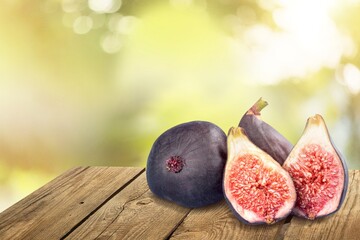 Fresh tasty ripe figs fruits on desk
