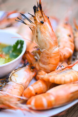 Grilled Shrimp - Shrimp burn bbq seafood on plate shrimps prawns cooking burnt on grill barbecue cooked and seafood sauce