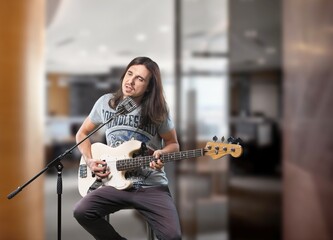 Inspired young person play music with guitar