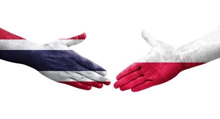 Handshake between Poland and Thailand flags painted on hands, isolated transparent image.