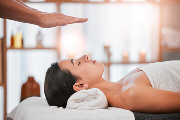 Reiki, energy and light with woman in spa for alternative medicine, spiritual and faith wellness....