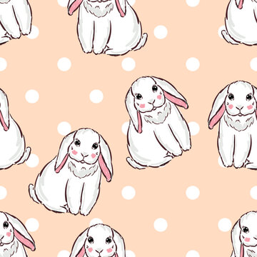 Seamless pattern with cute little hares with polka dots on beige background. Cute white baby bunnies for textile fabric design. © Evgeniya Sheydt