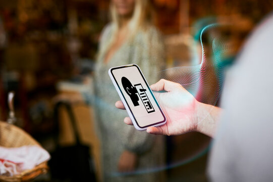 Woman reading fake news on cell phone