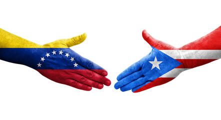 Handshake between Puerto Rico and Venezuela flags painted on hands, isolated transparent image.