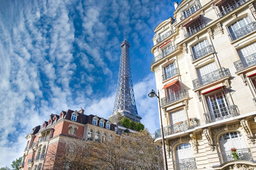 Paris, beautiful Haussmann facades in a luxury area of the capital, with the Eiffel Tower in background, avenue Rapp
