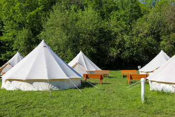 tent city. country life. outdoor recreation. triangular tents