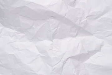 Obraz premium White crumpled paper texture background, clean white wrinkled paper, top view.