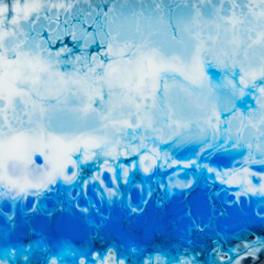 Fototapeta na wymiar Resin art with blue colors. Epoxy decoration