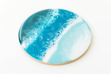 Resin art with turquoise colors. Epoxy effect background