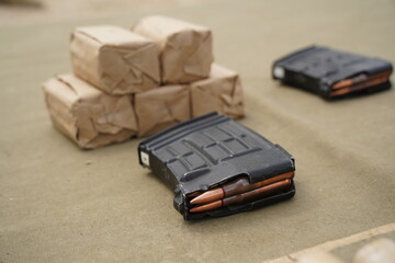 Almaty, Kazakhstan - 04.14.2022 : The cartridges are in the magazine of the machine gun. Military exercises.
