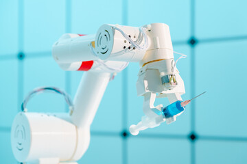 Robot hand with a medical syringe. Future medicine concept using robots and artificial intelligence