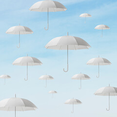 Fototapeta na wymiar Countless umbrellas are flying in the sky.