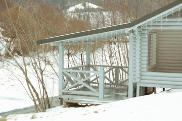 Cozy wooden alcove outdoor in winter season