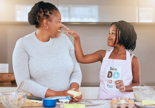 Happy, Mother And Child Learning Cooking Or Bake Cake In Kitchen At Home. Family, Breakfast Nutrition And Mom Reaching Kid Or Chef Development Activity Together, Love And Quality Time Conversation