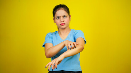 Young women have skin problems, irritation on her skin, skin infection itching red rash, arm...