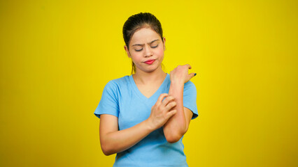 Young women have skin problems, irritation on her skin, skin infection itching red rash, arm...