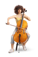 Female artist sitting and playing a cello © Ljupco Smokovski
