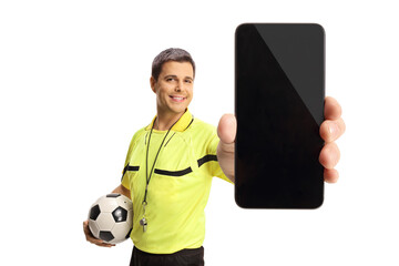 Football referee holding a ball and showing a smartphone