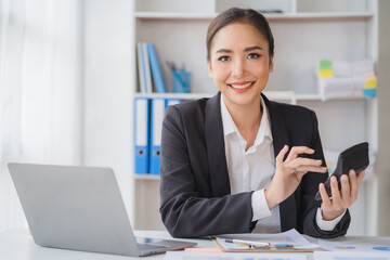Financial inspector calculating a numbers in office room.