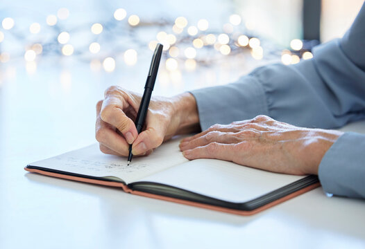 Notebook, Pen And Hands Of Old Woman Writing Calendar Schedule, Checklist Or Business Ideas In Planner. Alzheimer, Dementia And Elderly Care Person With Memory Loss Takes Daily Notes On Journal Paper