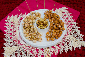 Crispy, healthy and homamade Phool Makhana or Fox Nuts snacks platter. It contain caramel makhana...