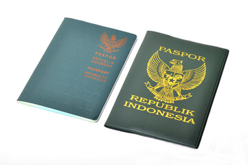 Republic of Indonesia passport book with green cover on white background