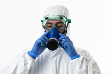 Doctor wearing protective biological suit and mask due to coronavirus 2019-nCoV global pandemic...