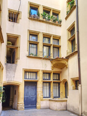 Traboule and court in Lyon old district of Saint Jean, picturesque historic passageways between streets