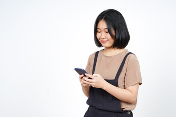 Naklejka premium Using Smartphone and Smiling Of Beautiful Asian Woman Isolated On White Background