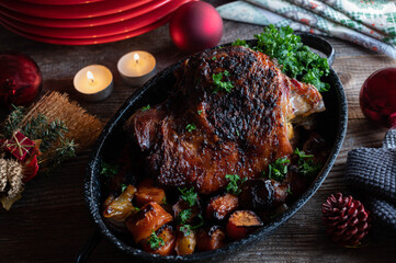 Christmas roast on wooden table  - roasted turkey shank