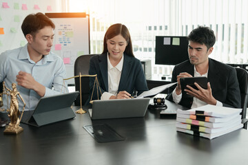 Lawyers having  Concepts of Consulting team work Legal services at the law office. 