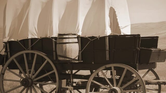 Simulated old photograph of wagons on the Oregon trail
