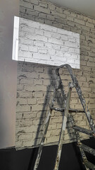 Repair in a residential building. On the wall there is paper with a brick pattern, painting, plaster.