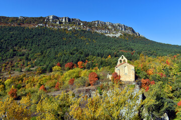 Autumn image of the Church of San Esteban in the town of Ribera. Valderejo Natural Park. Alava,...