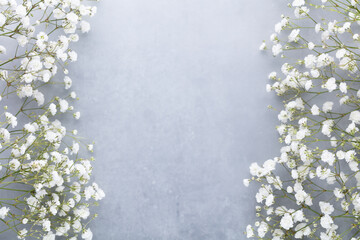 Beautiful flower background of pink gypsophila flowers. Flat lay, top view. Floral pattern.