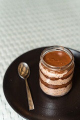 Delicious Chocolate Mousse Or Pudding With Whipped Cream In A Vintage Glass Jar - obrazy, fototapety, plakaty