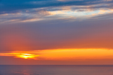 Naklejka na ściany i meble Sunset at mediterranean sea. Idyllic seascape in Balearic islands, Spain