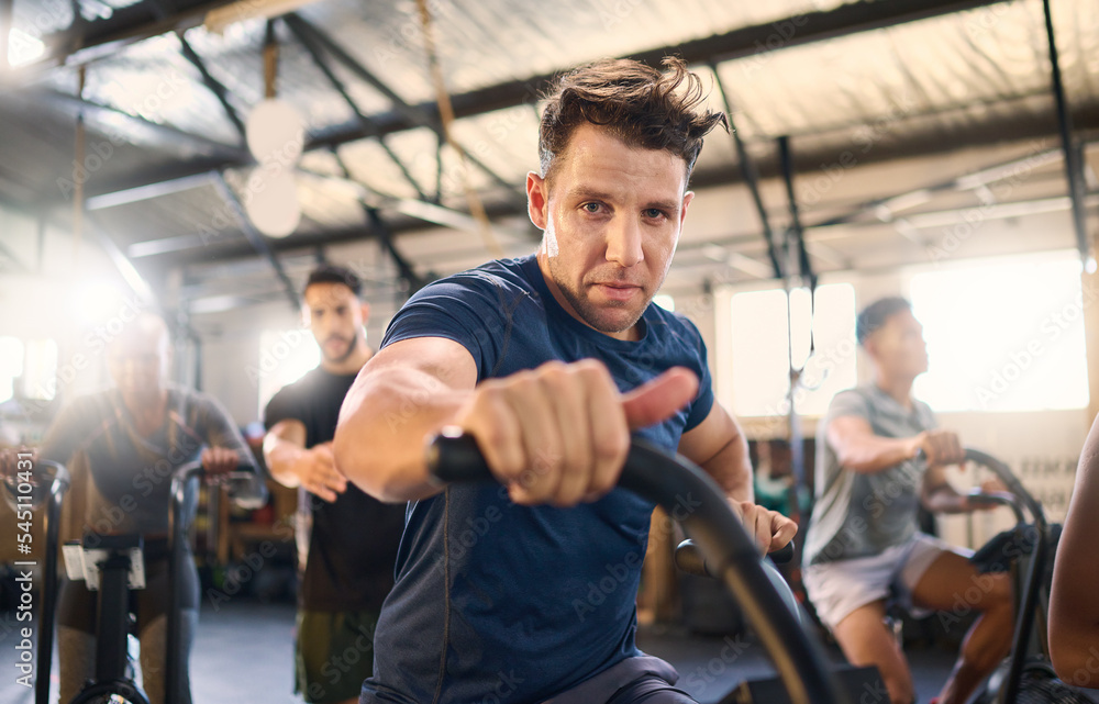 Sticker Bike, class and exercise man portrait with cycling training, wellness and fitness gym group. Athlete with motivation doing a bicycle, sports and spinning workout at a health cub or studio with people