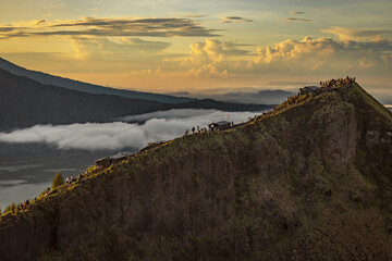 Breathtaking sunrise over Abang mountain, view from Batur volcano and Batur lake, Bali, Indonesia