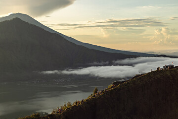 Breathtaking sunrise over Abang mountain, view from Batur volcano and Batur lake, Bali, Indonesia